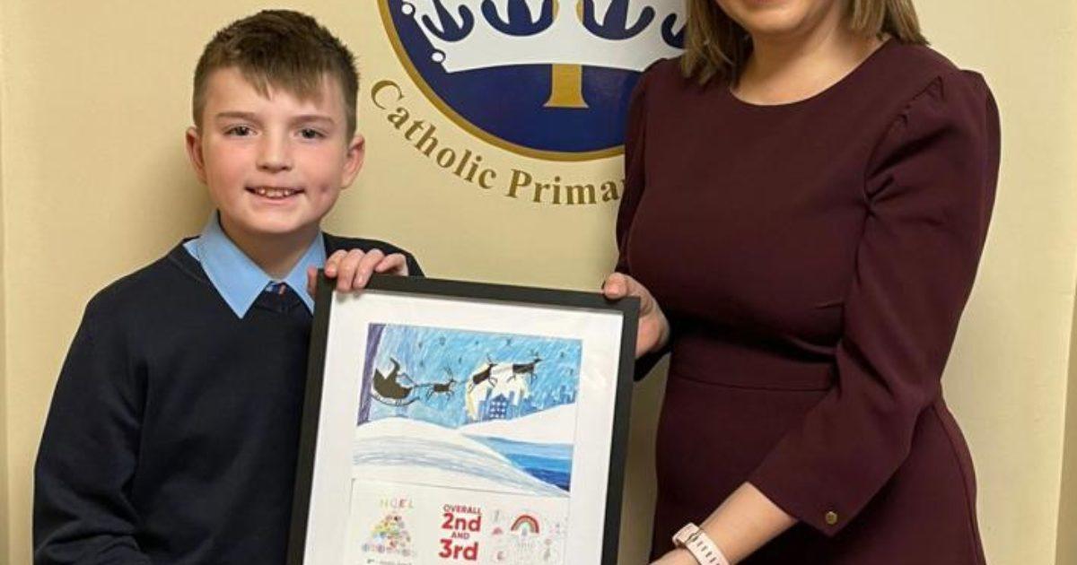 Stephanie Peacock Presents First Prize for Christmas Card Competition