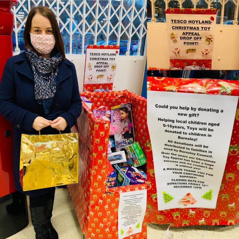 Stephanie donating to Hoyland toy appeal