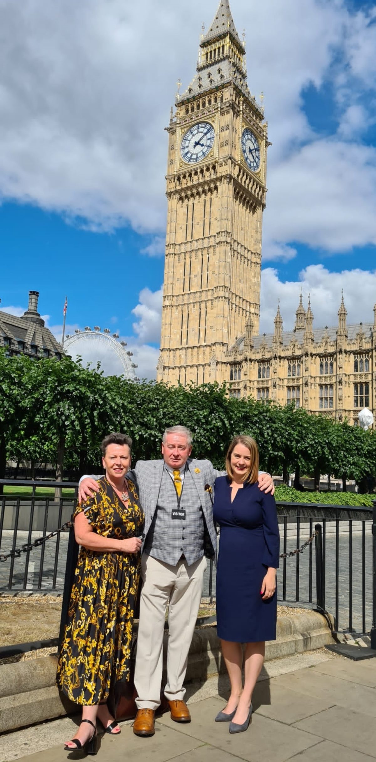 Stephanie Peacock MP with Johnny and Jill Wood in front of Parliament