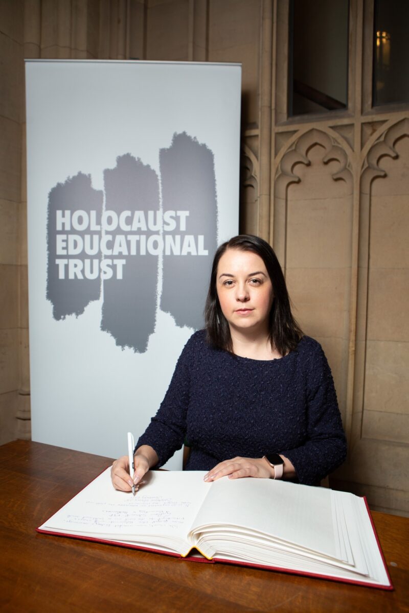 Stephanie Peacock MP signing the Holocaust Memorial Book in Parliament
