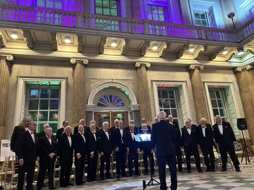 Image of Thurnscoe Male Voice Choir singing at the Centenary performance