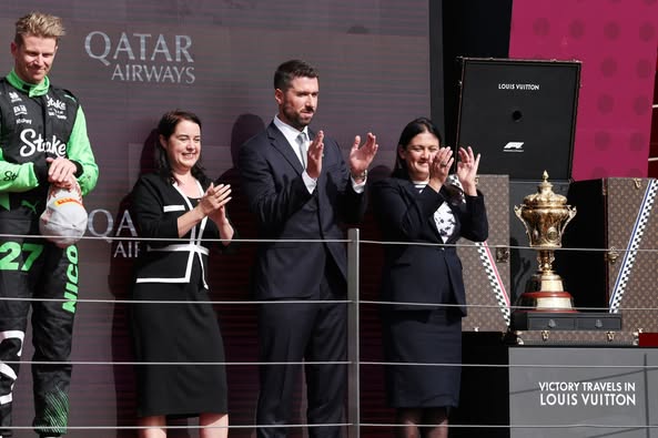 Stephanie Peacock MP on the podium to present a trophy at the Grand Prix