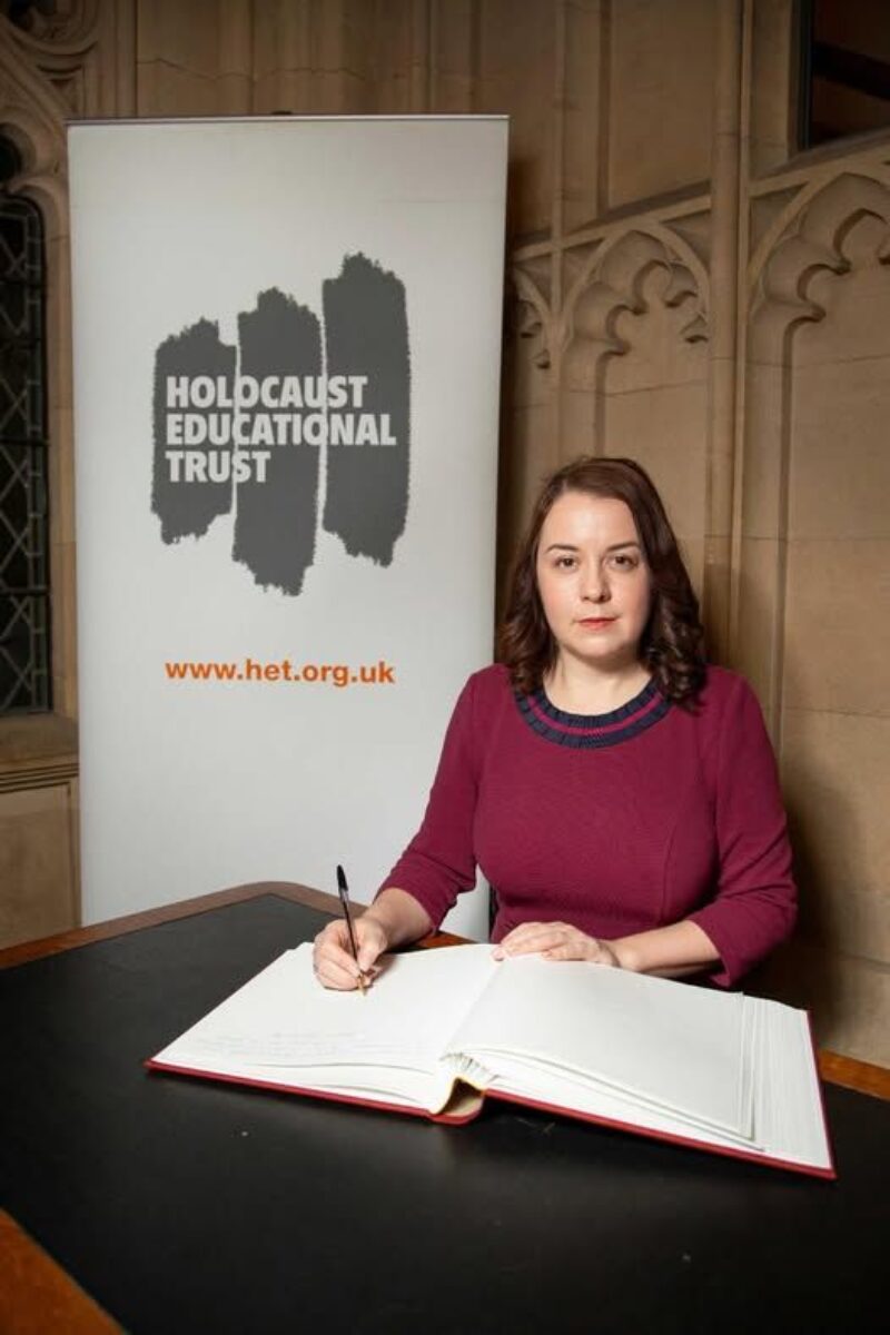 Stephanie Peacock MP signing the Holocaust Book of Remembrance in Parliament on behalf of Barnsley South